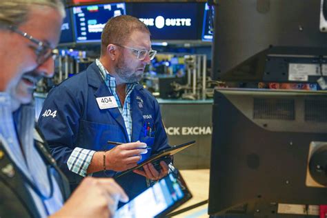 Stock market today: Wall Street ticks higher ahead of another packed week of corporate earnings